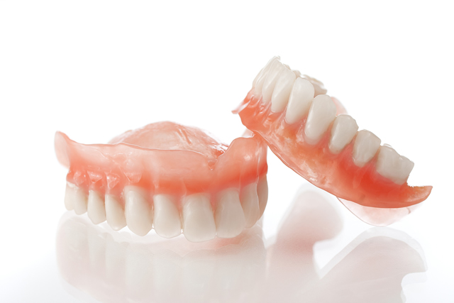 bigstock-Denture-close-up-25474094